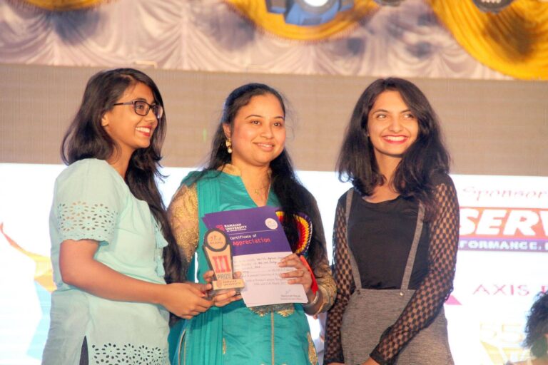 Priyadarshini Distributing Certificate to Ramaiah Univeristy Students