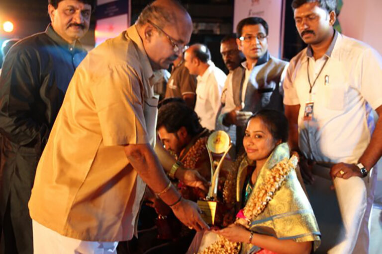 Priyadarshini receiving Best Playback Singer Award in Bengaluru International Youth Festival in 2014_