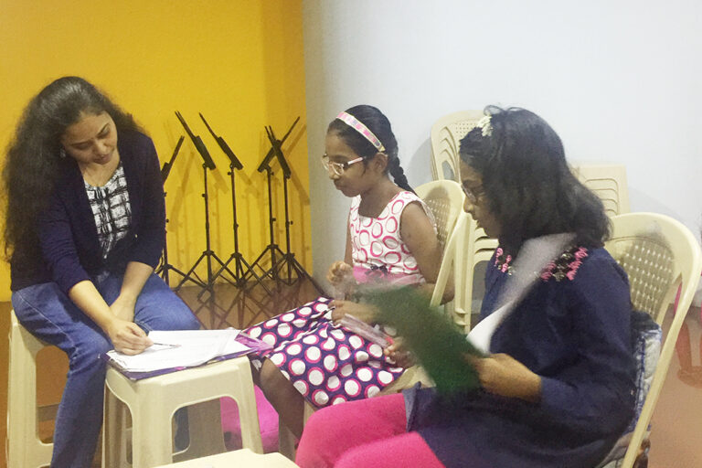 Priyadarshini teaching Western Music to special kids batch appearing for International Music Board examinations